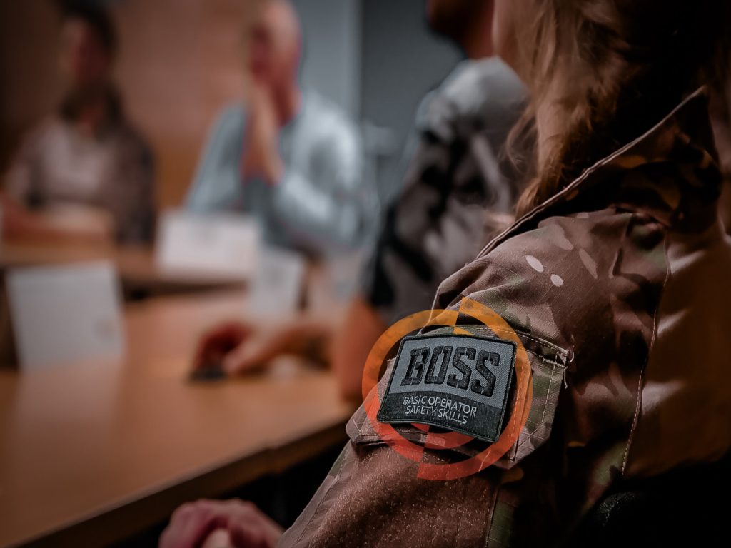 BOSS-workshop patch op de schouder van een deelnemer